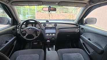 barter disk: Mitsubishi Outlander – boz rəngli, universallığı və rahatlığı ilə — 8