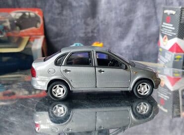metbex tavan modelleri: Коллекционная модель Lada Kalina VAZ1118 silver 2004 Welly Scale — 9