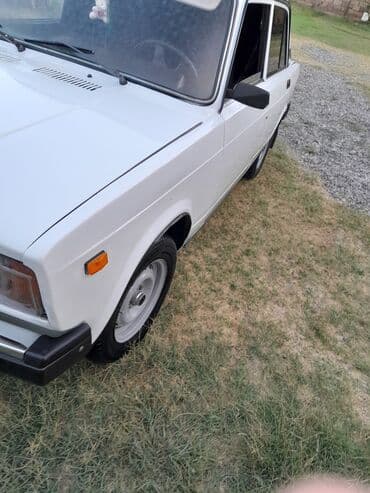 опель зафира а: Lada 2107 sedan – ağ rəng Xüsusiyyətlər: - Kuzov: 4 qapılı sedan, ağ — 7