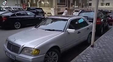 şuşə silən: Mercedes-Benz C-Class: 2.8 l | 1994 il Sedan — 2