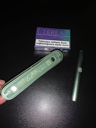 yun koftalar: IQOS ILUMA (yaşıl rəng) tütün qızdırma cihazı və TEREA Purple Wave — 4