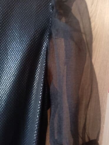 atlas köynəklər: KOTON-dan,qara, qolları tüllü, parıltılı bluz. 42 ölçüdür. Cəmi bir — 4