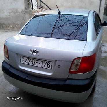 opel astra 1996: Kia Rio: 1.5 l | 2006 il Sedan — 4