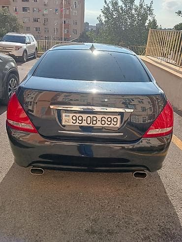 man sat: Nissan Teana – qara rəngli, geniş və komfortlu sedan. Xüsusiyyətlər — 4