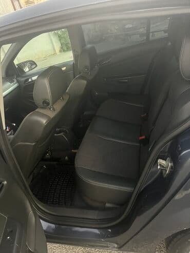 kia sportage 2006: Opel Astra H – 5 qapılı hetçbek Xüsusiyyətlər: - Kuzov — 12