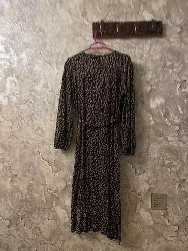 Ətəklər: Qadın paltarı – leopard naxışlı, qara əsaslı - Model: uzun — 2