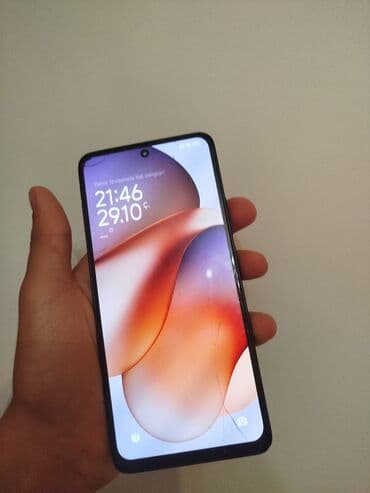 xama çəkən: Xiaomi Redmi smartfon - Arxa paneldə “Redmi” loqosu və 108MP əsas — 3