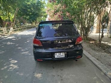 lada niva cadır: Mitsubishi Airtrek, qara rəng, universal kuzov. Xüsusiyyətlər: - — 1