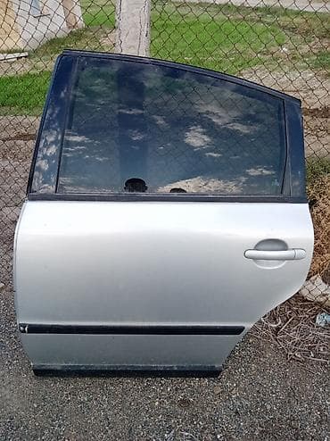 Sol arxa, Volkswagen passat b5, 1999 il, ABŞ, Ünvandan götürmə