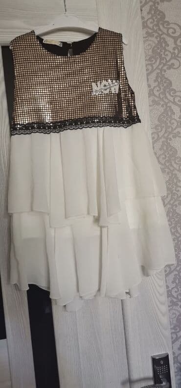 детские вещи на комиссию: 5 - 7 yaşa. yeni kimidi cəmi 1 dəfə qeynilib — 2