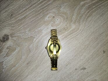 apple watch 8: Qızılı rəngli qol saatı - Korpus və qolbaq: metal, qızılı rəng — 6