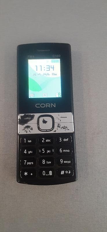 yaxşı telefonlar: CORN C100 düyməli mobil telefon Xüsusiyyətlər: - Rəqəmsal ekran — 1
