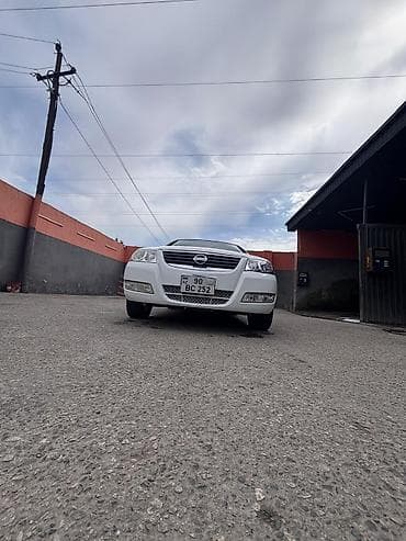klas 6: Nissan Sunny: 1.6 l | 2007 il Sedan — 9