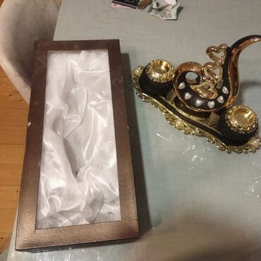 qara sam: Samdanin biri sinib Zərif qara və qızılı rənglərdə hazırlanan bu — 2