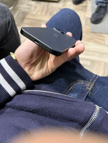 IPhone 15, 128 GB, Qara, Face ID — 6