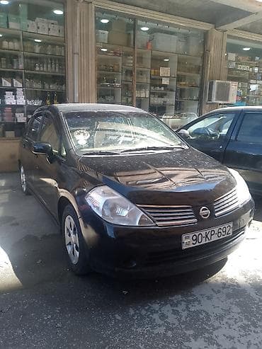 ford 0 km: Nissan Tiida: 1.6 l | 2007 il Sedan — 3