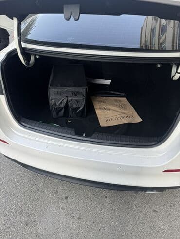 Avtomobil alışı: Kia Optima – ağ rəngdə, sedan kuzov. - Güclü və qənaətcil benzin — 5