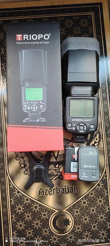 TRIOPO Electronic Camera Flash seti Məhsulun tərkibi: - TRIOPO — 1
