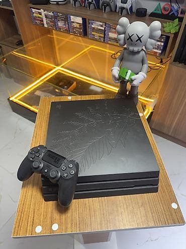 macbook pro: 🎮 PlayStation 4 Pro The Last of Us Edition Tam işlək vəziyyətdədir — 4