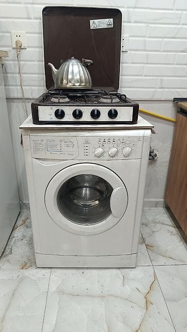 tv ekran təmiri: Indesit E washing machine – ön yükləməli, kompakt ölçülü model — 1