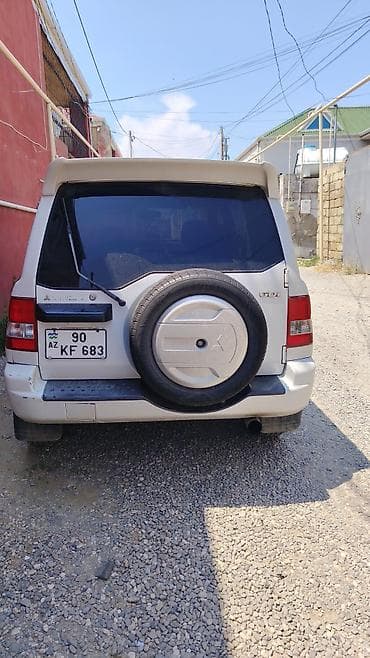 mitsubishi eclipse: Mitsubishi Pajero iO (GDI) – ağ rəngli, 5 qapılı yolsuzluq/siti — 2