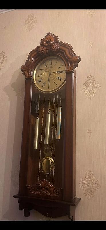 Divar saatları, Mexaniki, Mayatnik