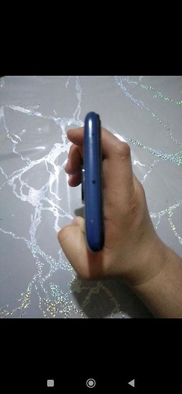 planşetlər və qiymətləri: Xiaomi Redmi (model arxa qapaqda “Redmi” loqosu ilə). Rəng: tünd mavi — 4