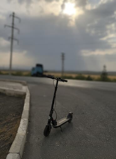 Yetişkinlər üçün nəzərdə tutulmuş bu qara rəngli skuter, səyahətlər və lalafo.az -da Yetişkinlər üçün nəzərdə tutulmuş bu qara rəngli skuter, səyahətlər və