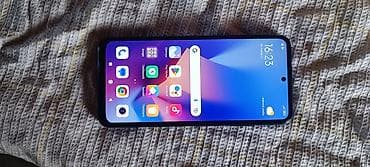 Redmi smartfon Qara rəngli Redmi smartfon. Şəkillərdən göründüyü kimi