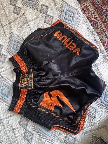 Venum muay tay/ kickboks şortu - Rəng: qara–narıncı - Material