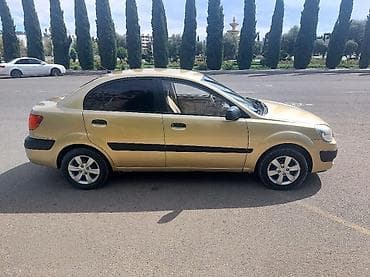 kia ceed kredit: Kia Rio sedan – qızılı rəng - Kuzov: 4 qapılı sedan, şüşələr — 3