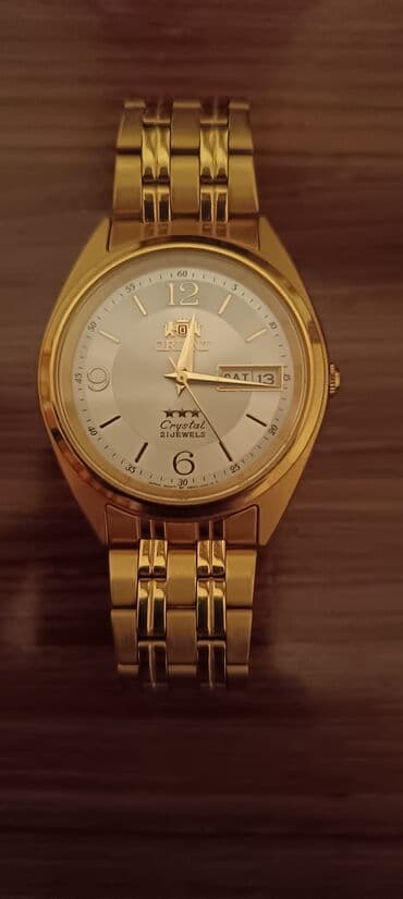 kisi ucun qizil: Yeni, Qol saatı, Orient, rəng - Qızılı — 1