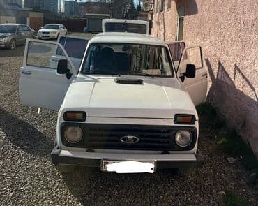 kia islenmis ehtiyyat hisseleri: Lada Niva 2131, ağ rəng, 4 qapılı İli 1999. Yürüş 240380. 1.8 — 2