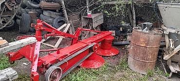 on yukleyici traktor: === PART 1: TEXTUAL DESCRIPTION === İki diskli qırmızı kənd — 2