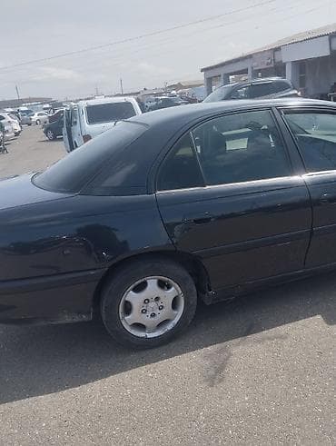 passat b6 bufer: Opel Omega B sedan - Kuzov: 4 qapılı sedan, qara rəng - Salon: qara — 1