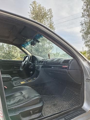 ulduz disk: BMW 7 Series sedan (E38), gümüş rəngli, 4 qapılı, arxa ötürücülü — 9