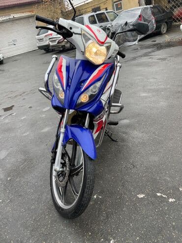 wolt moped: Honda - RX18 — 3