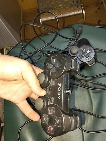 PlayStation 2 (PS2) komplekti - Konsol: Sony PlayStation 2 Slim (üst — 5