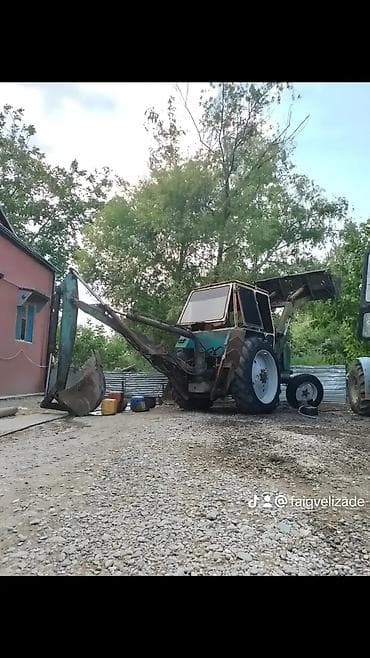 13 təkərlər: Ekskavator-yükləyici (traktor əsaslı) – ön kovası və arxa ekskavator — 2