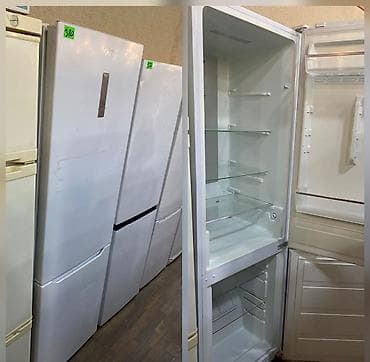 tap az soyuducu: Ağ rəngli, ikiqapılı soyuducu. Yuxarıda soyutma bölməsi, aşağıda — 1