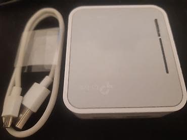 data kart limitsiz internet: TP-Link daşınan Wi‑Fi router (travel router) Xüsusiyyətlər: - Kompakt — 1