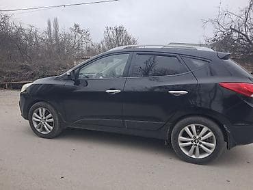 запчасти opel omega b: Hyundai ix35 – qara rəngli, şəhər və uzun yol üçün rahat krossover — 2