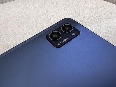 planset tablet: Oteeto planşet - Korpus: nazik, yastı kənarlı metal gövdə, tünd mavi — 5