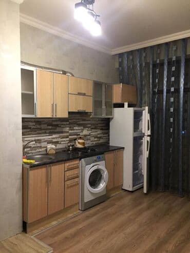 yeni gunəşlidə 1 otaqlı evlər: Nərimanov metrosu,metroparknan üzbəüz 16 mərtəbənin 9-cu mərtəbəsi ev — 4