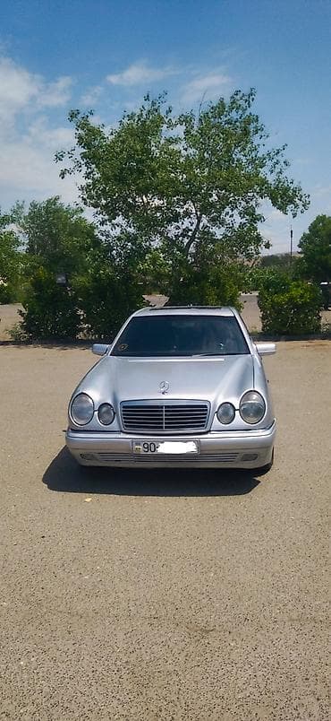 disk 14: Mercedes-Benz E-Class: 2.3 l | 1996 il Sedan — 1
