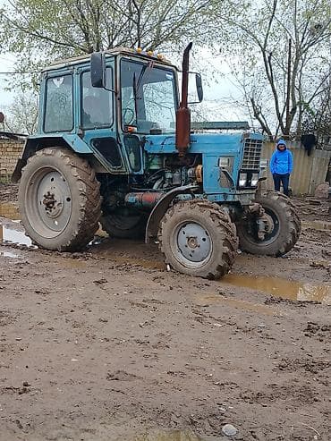 cuce cixaran inkubator: Təsvir: - Təkər formulalı mavi rəngli kənd təsərrüfatı traktoru - — 2