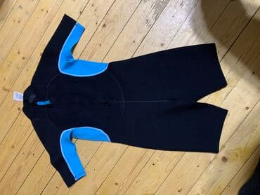 dalgic: Tribord firmasinin dalgic kostyumu. suda uzmek ucun geyimi. 1.5mm. Az — 3