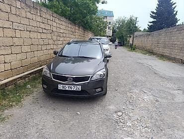 pulsuz ehtiyacı olan: Kia Cee’d SW (universal) – tünd boz rəng, 5 qapılı, dam relsləri ilə — 6