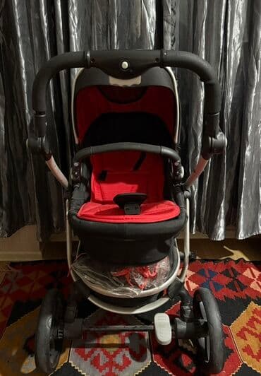 mutsy igo universal arabalar: Uşaq arabası – çoxfunksiyalı, qara-rəngli şassi və qırmızı içliklə — 2