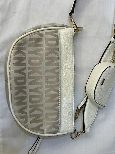 pul kiseleri: DKNY çiyin çantası – krem/ağ rəng palitrasında, qızılı detallarla. - — 2